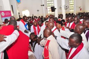 Priests_laying_hands_on_the_newly_priested_deacon
